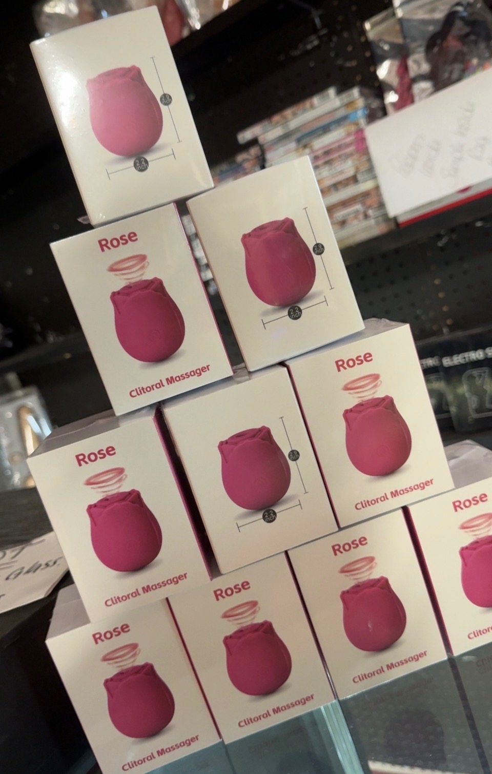 Pink rose-style massagers in their store display